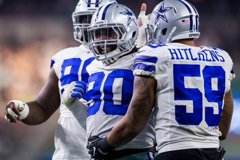 Dallas Cowboys defensive end Demarcus Lawrence (90) celebrates a sack during the second...