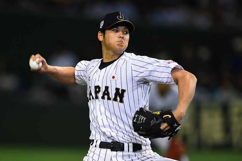 TOKYO, JAPAN - NOVEMBER 19: Starting pitcher Shohei Otani #16 of Japan throws in the top of...