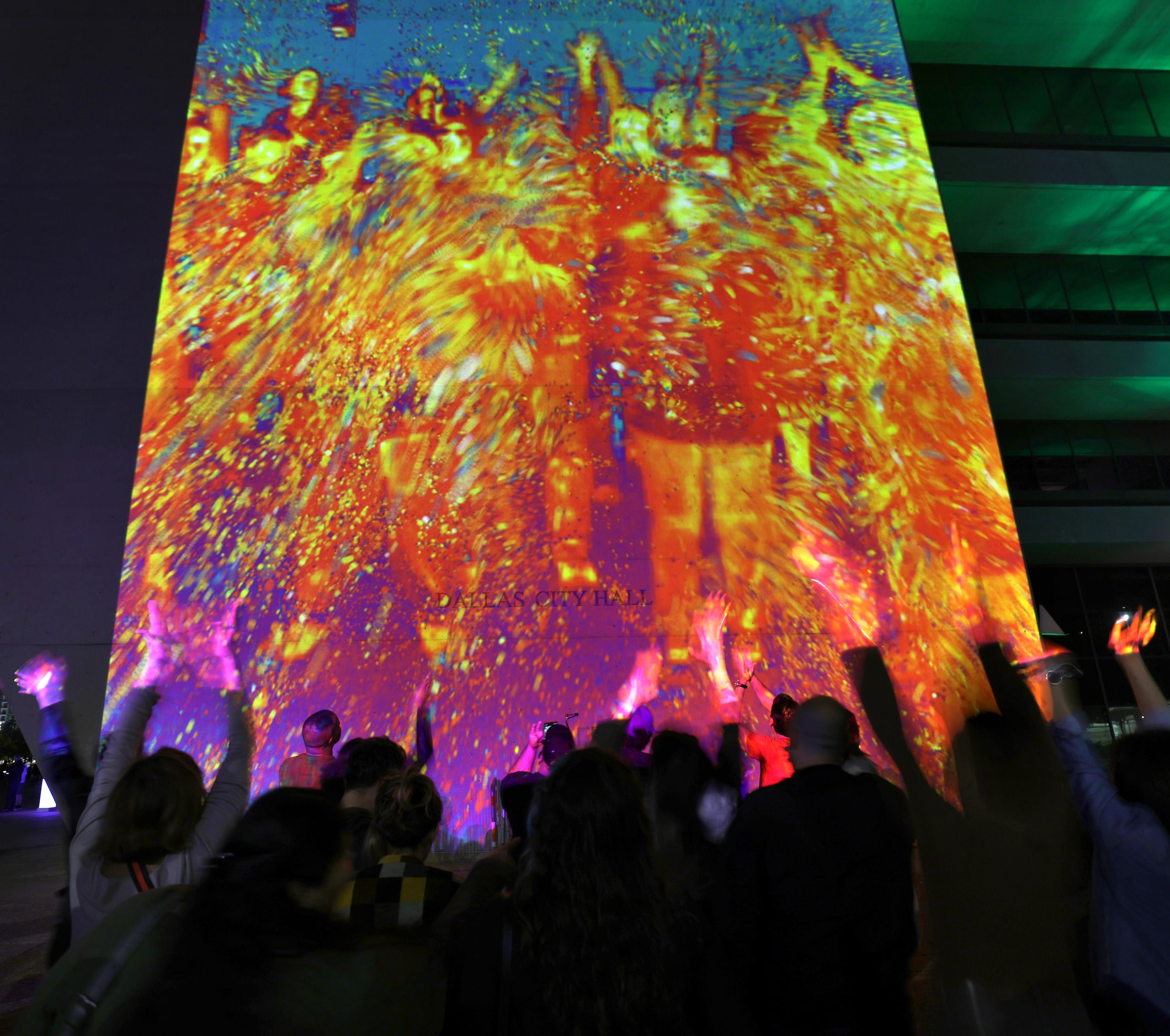 Community members interact with art installations during Aurora in downtown Dallas, TX, on...