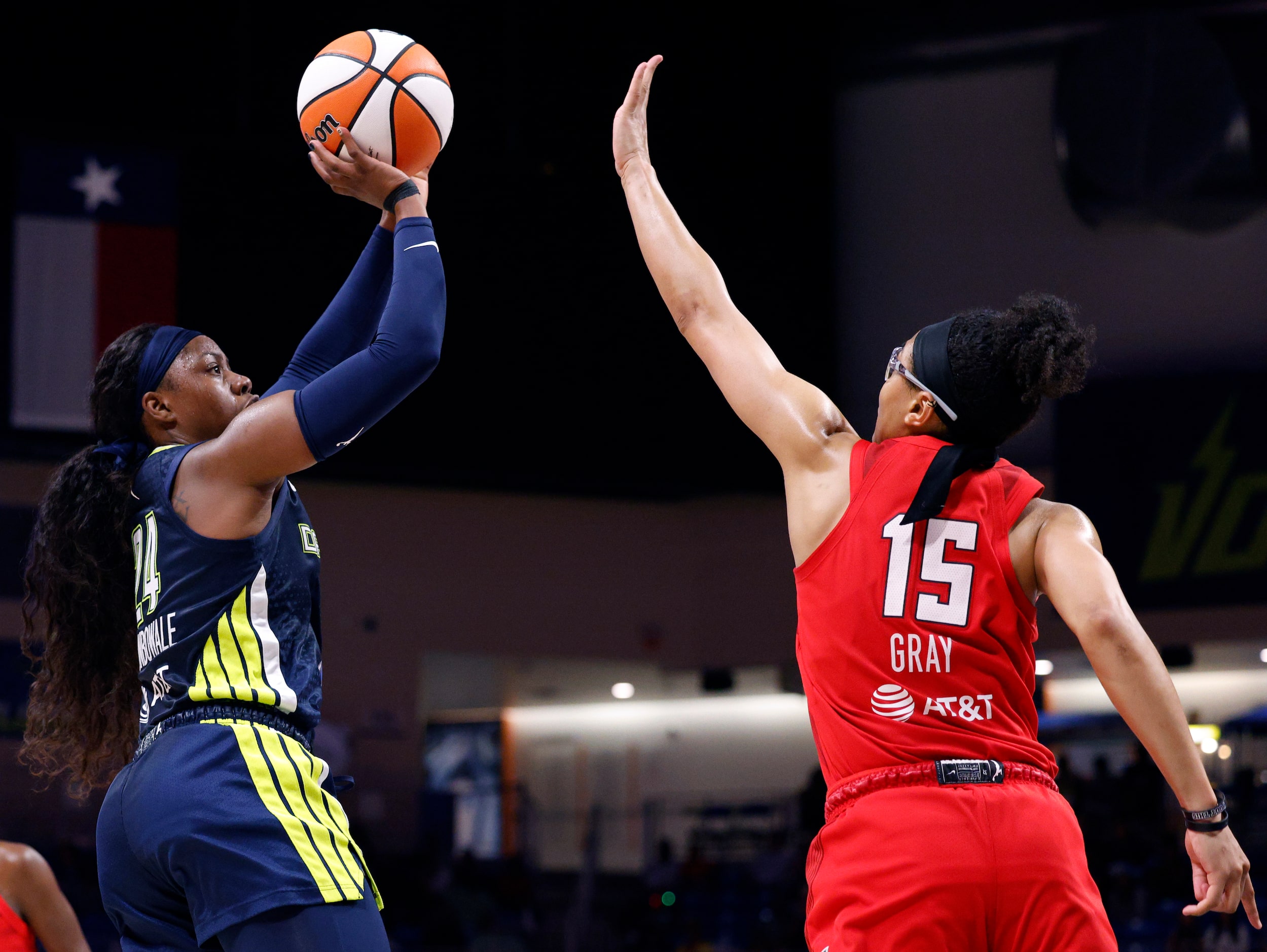 Dallas Wings guard Arike Ogunbowale (24) shoots the ball over Atlanta Dream guard Allisha...