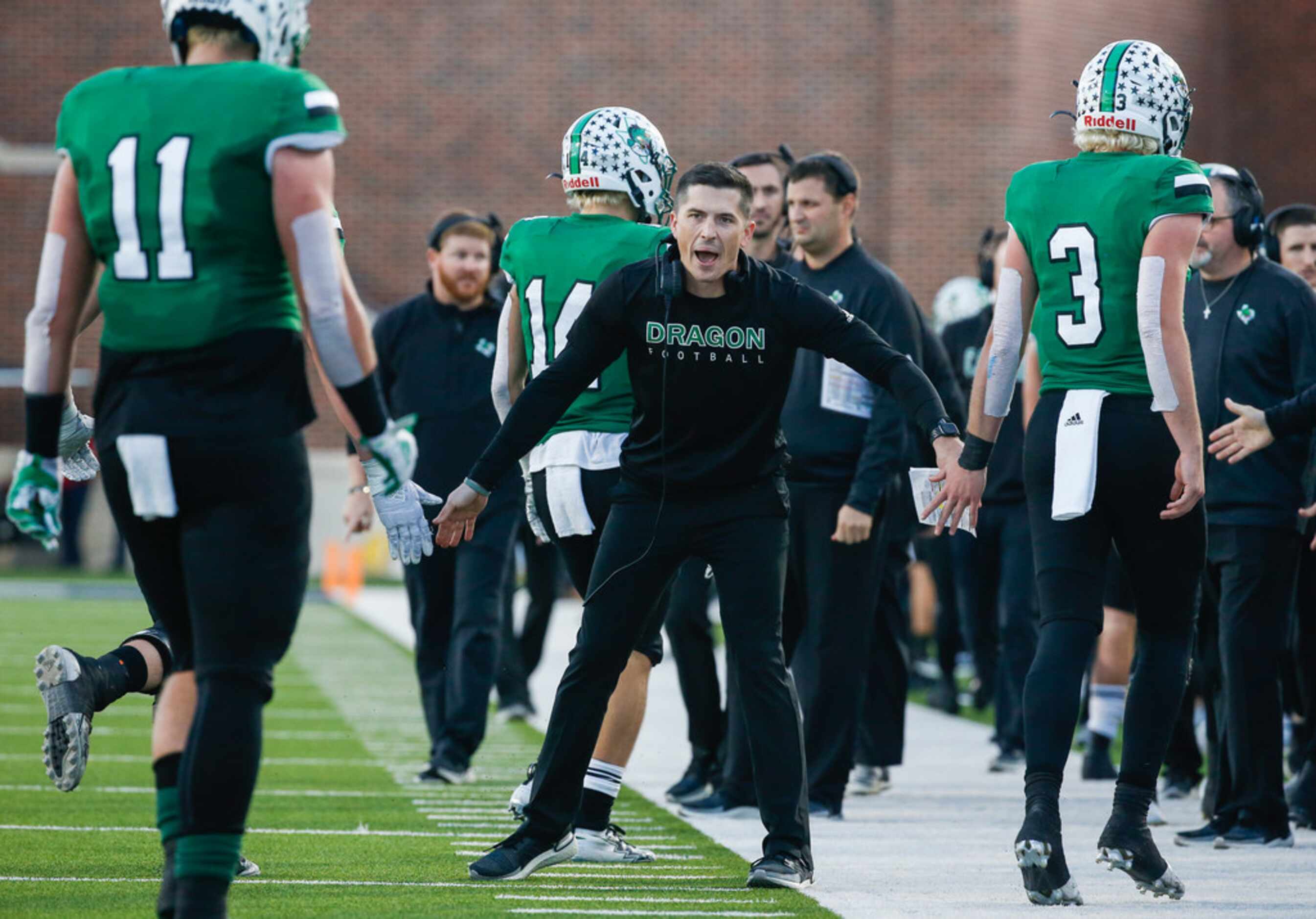 Southlake Carroll head coach Riley Dodge celebrates a touchdown during the second half of a...