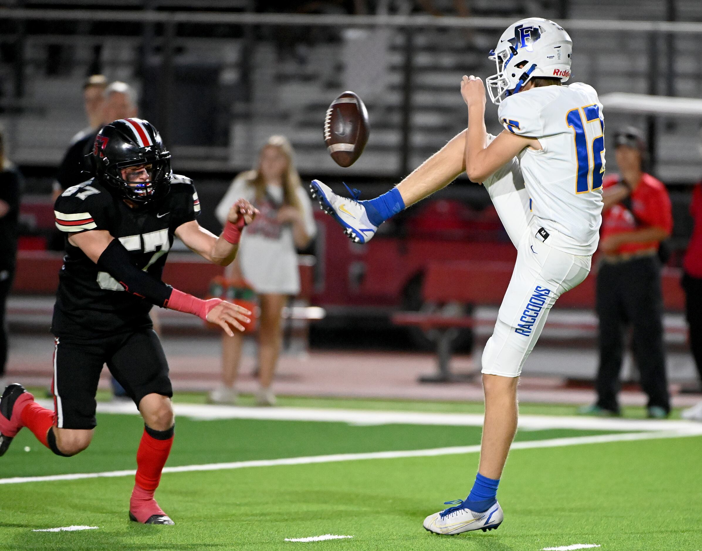 Lovejoy's Reid Jacob (57) blocks a punt by Frisco's Mason Stallons (12) in the first half of...