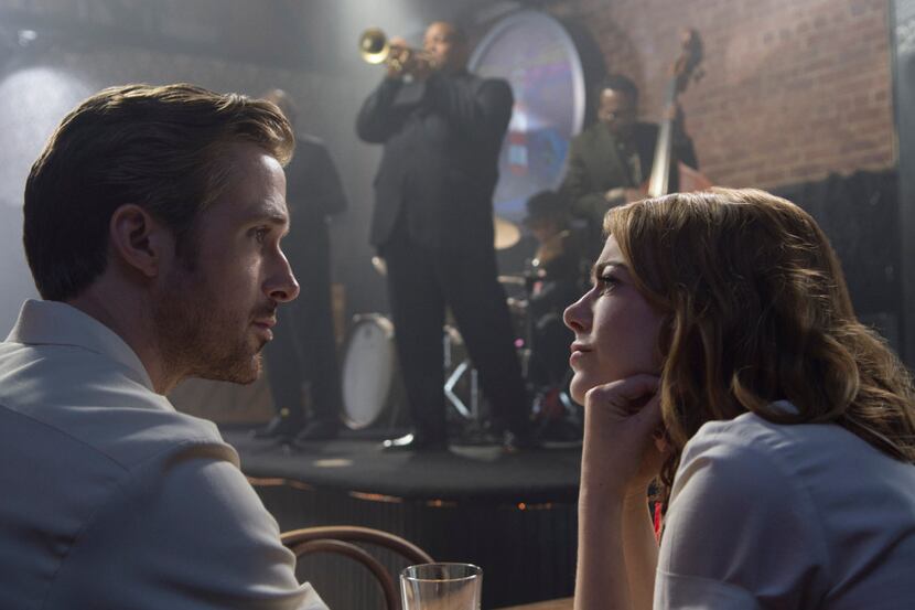 This image released by Lionsgate shows Ryan Gosling, left, and Emma Stone in a scene from,...