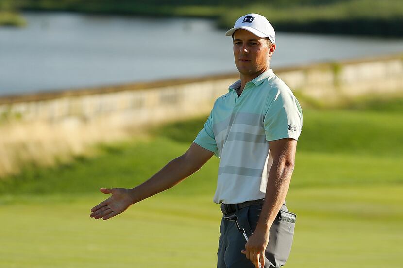 JERSEY CITY, NEW JERSEY - AUGUST 10: Jordan Spieth of the United States reacts on the 18th...