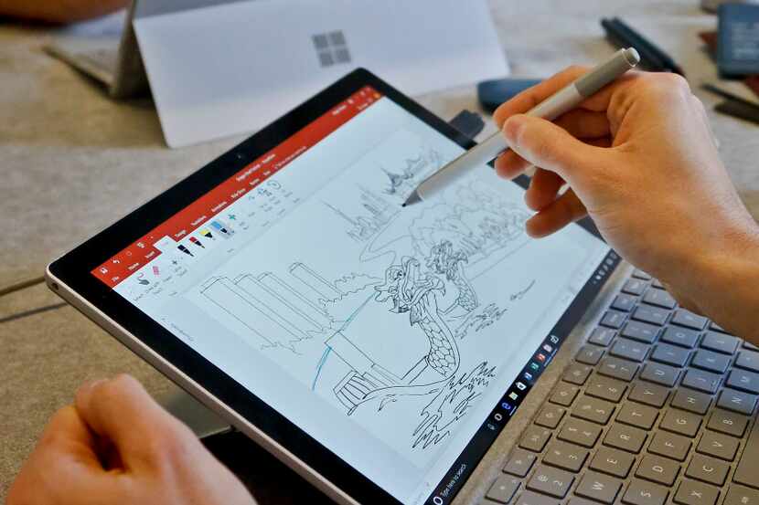 In this Tuesday, May 16, 2017, photo, Microsoft's new Surface Pro laptop-tablet hybrid is...