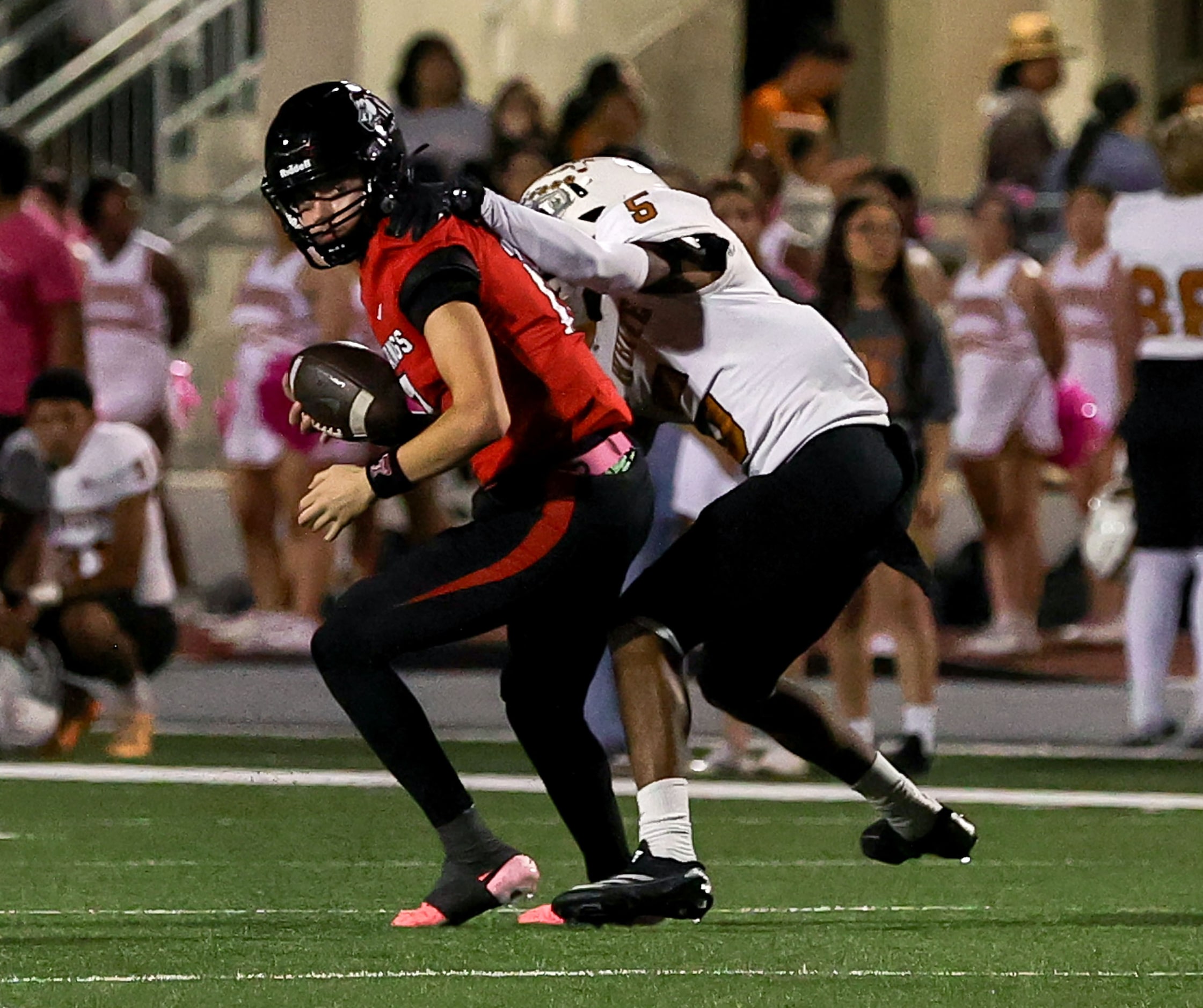 Creekview quarterback Cason Garcia (17) is sacked by W.T. White defensive end Jamarious...