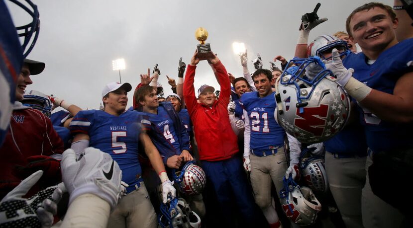 Westlake head coach Todd Dodge, center, celebrates the 56-7 victory over North Mesquite...