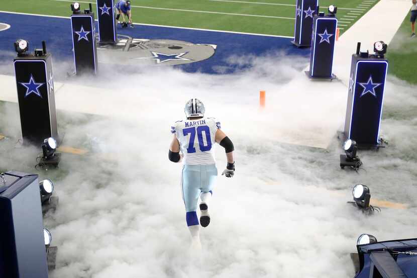 Dallas Cowboys offensive guard Zack Martin (70) takes the field before playing the Atlanta...