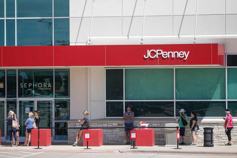Shoppers line up as they await the reopening of J.C. Penney on May 1 in Fairview, Texas.