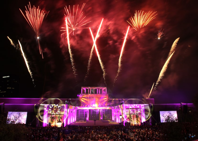 AND SET TO A SONG ... Fireworks explode following the lighting of Freedom Hall during the...