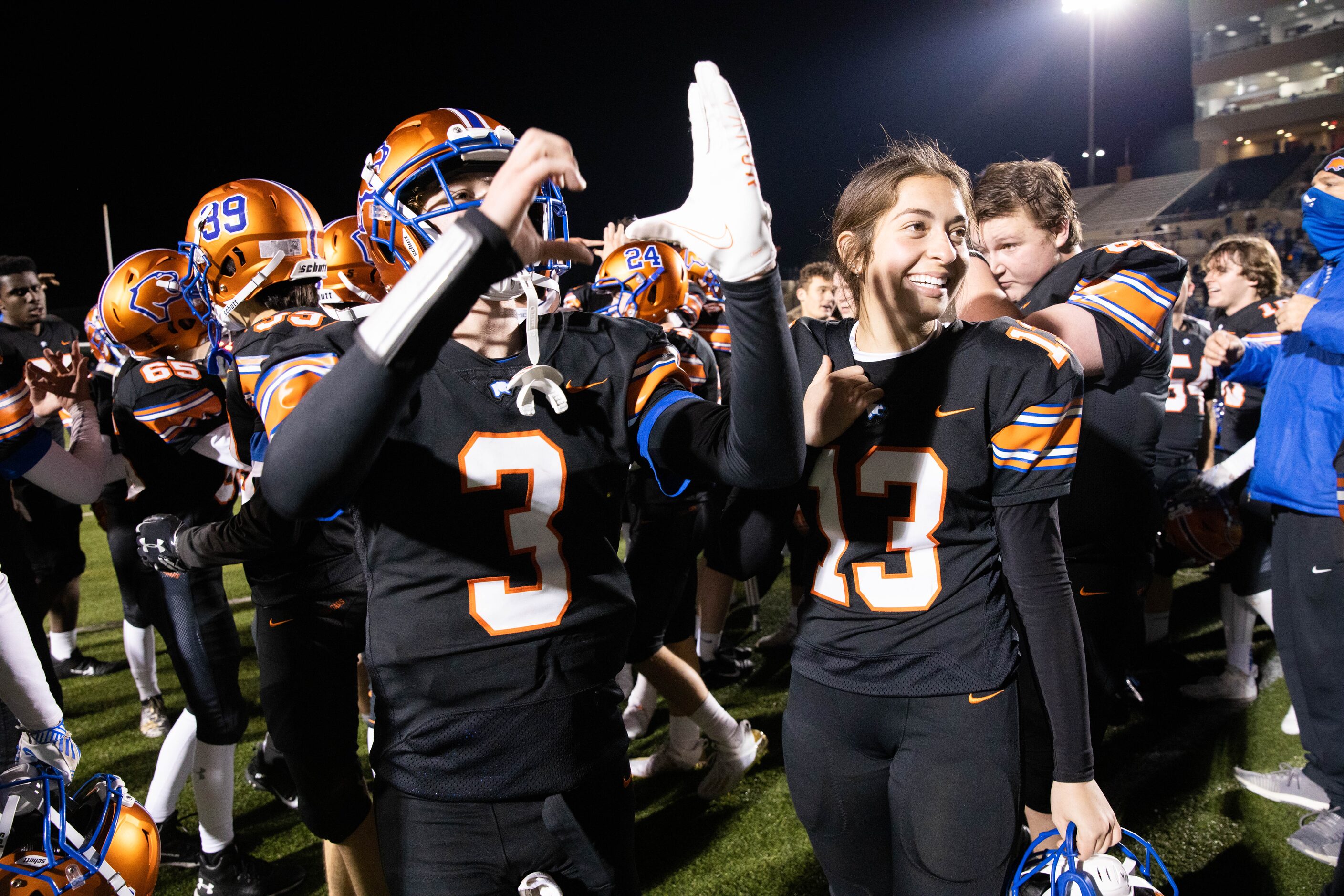 Colleyville Covenant's Hunter Jordan (3) and Alana Meggison (13) celebrate winning the TAPPS...