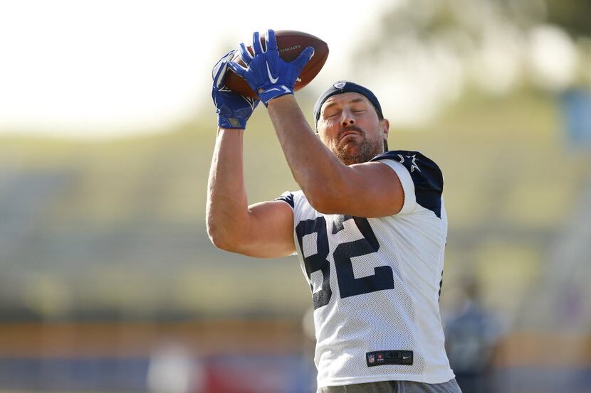 Dallas Cowboys tight end Jason Witten (82) catches a pass with his eyes shut during an...