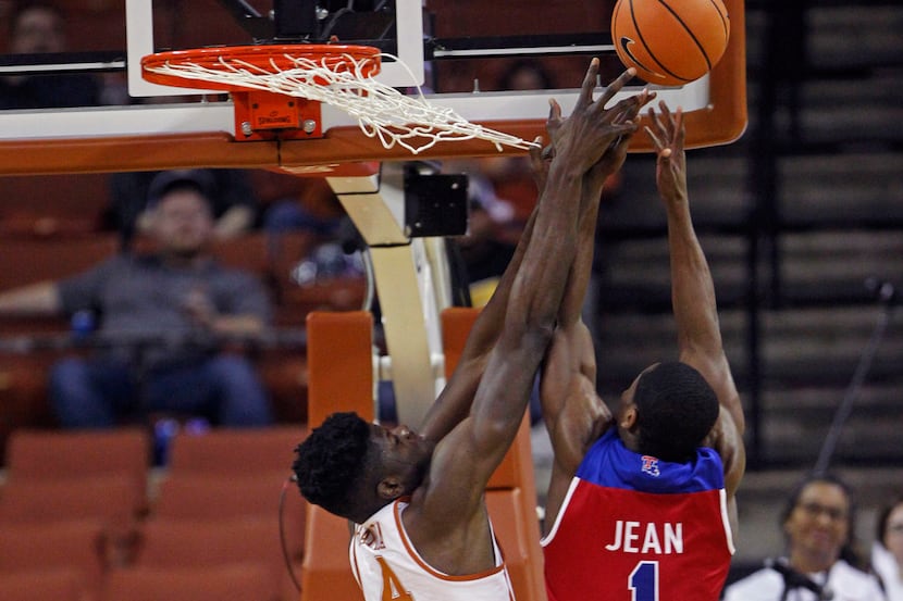 Texas center Mohamed Bamba (4) goes up for the rebound against Louisiana Texas guard Derrick...