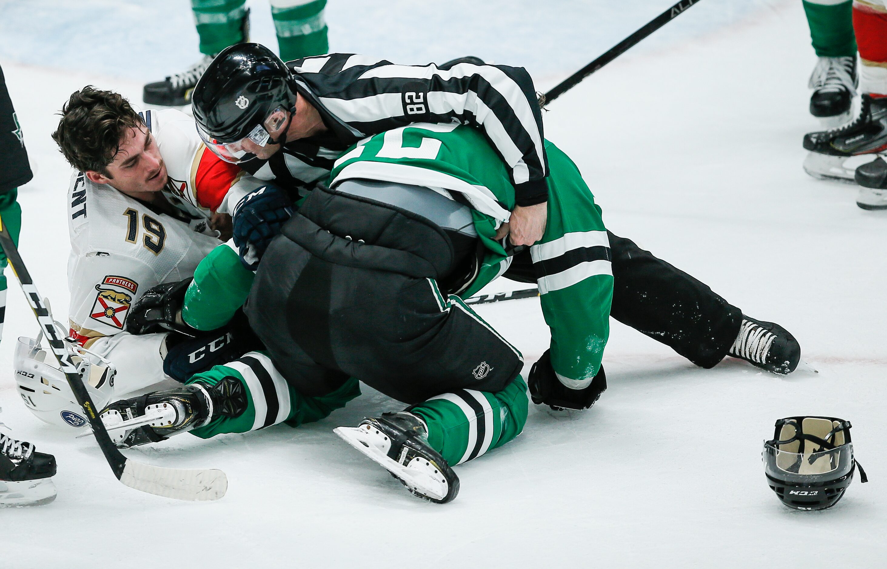 Dallas Stars forward Radek Faksa (12) and Florida Panthers forward Mason Marchment (19)...