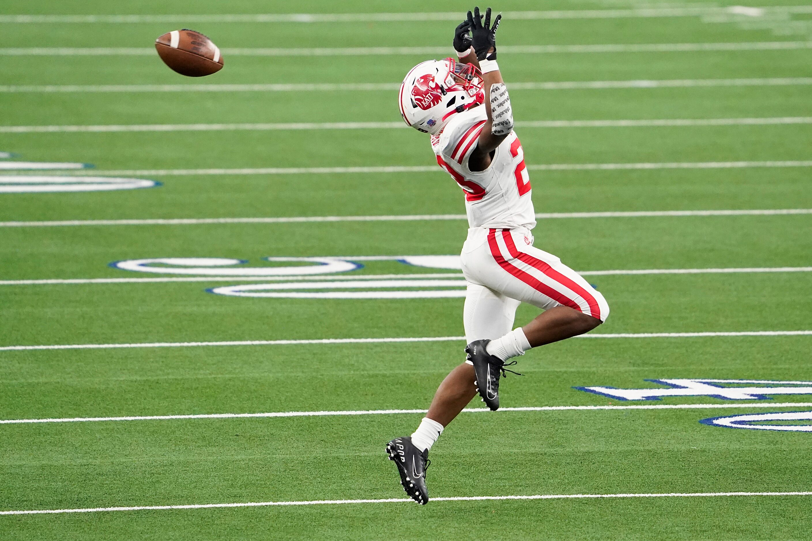 Katy running back Seth Davis (23) has  pass go off his hands during the first half of the...