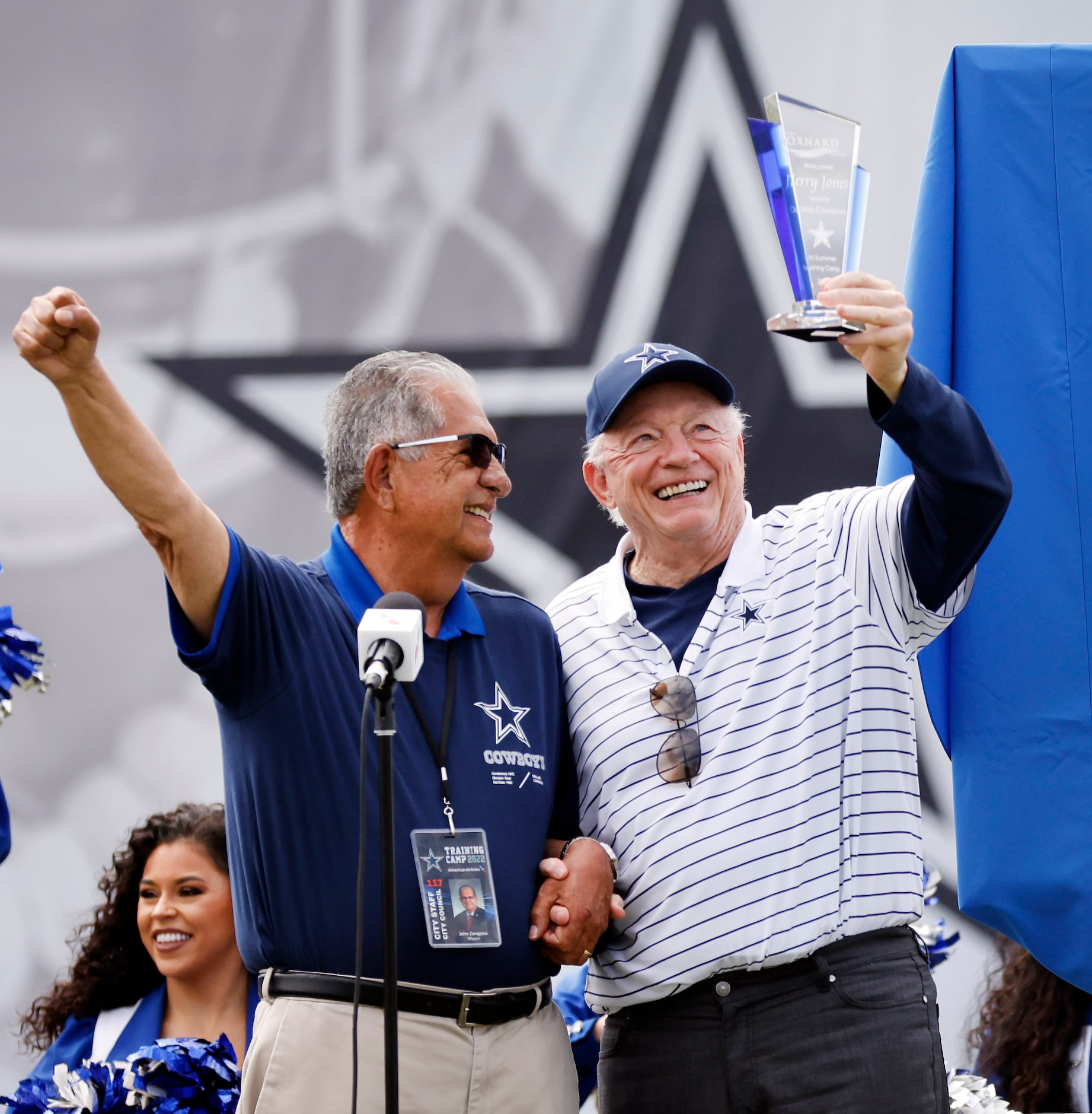 Dallas Cowboys owner Jerry Jones hoists a crystal given him by City of Oxnard Mayor John C....