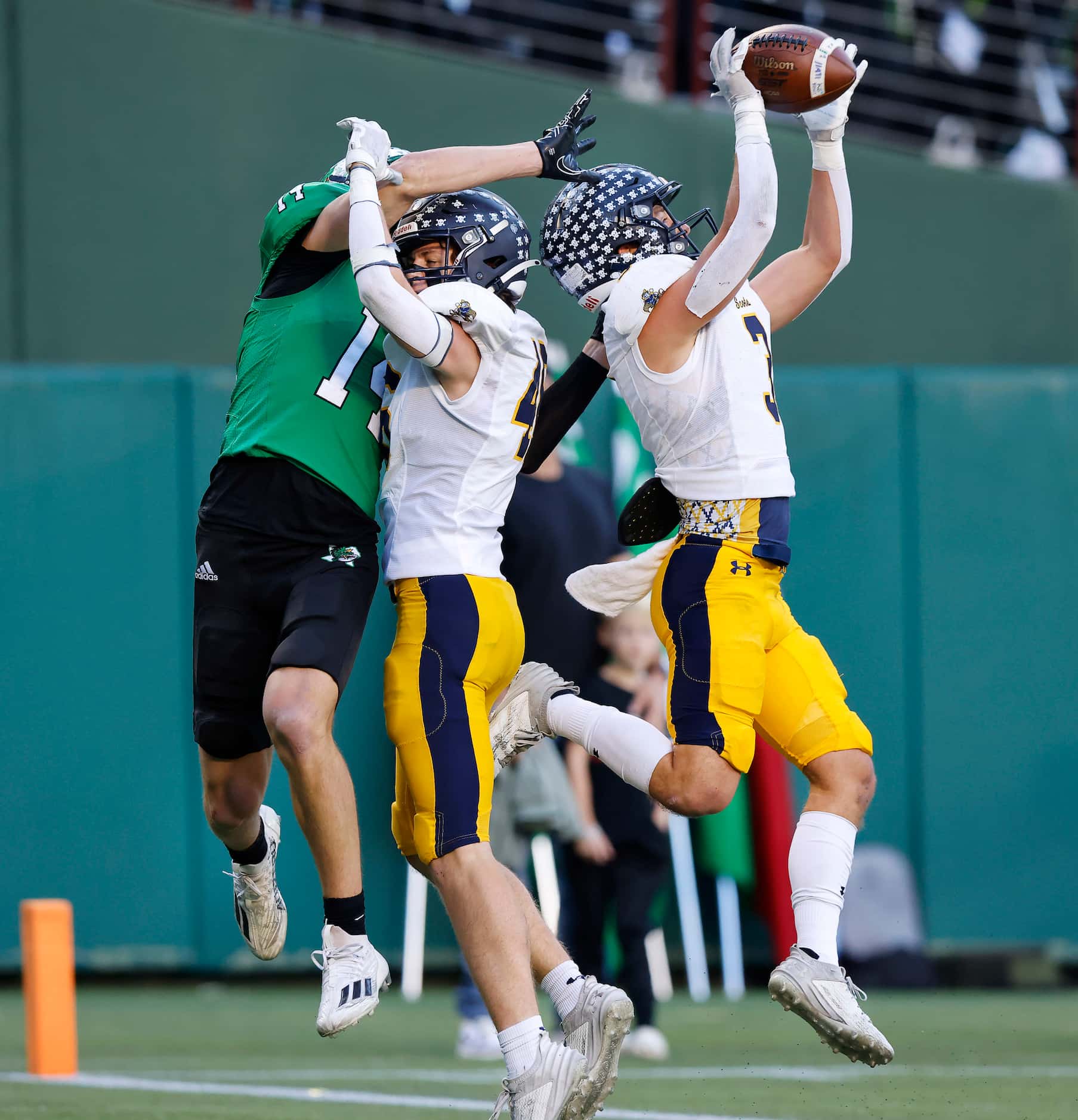 Highland Park cornerback Weston Giese (3) intercepts a pass in the end zone that was...