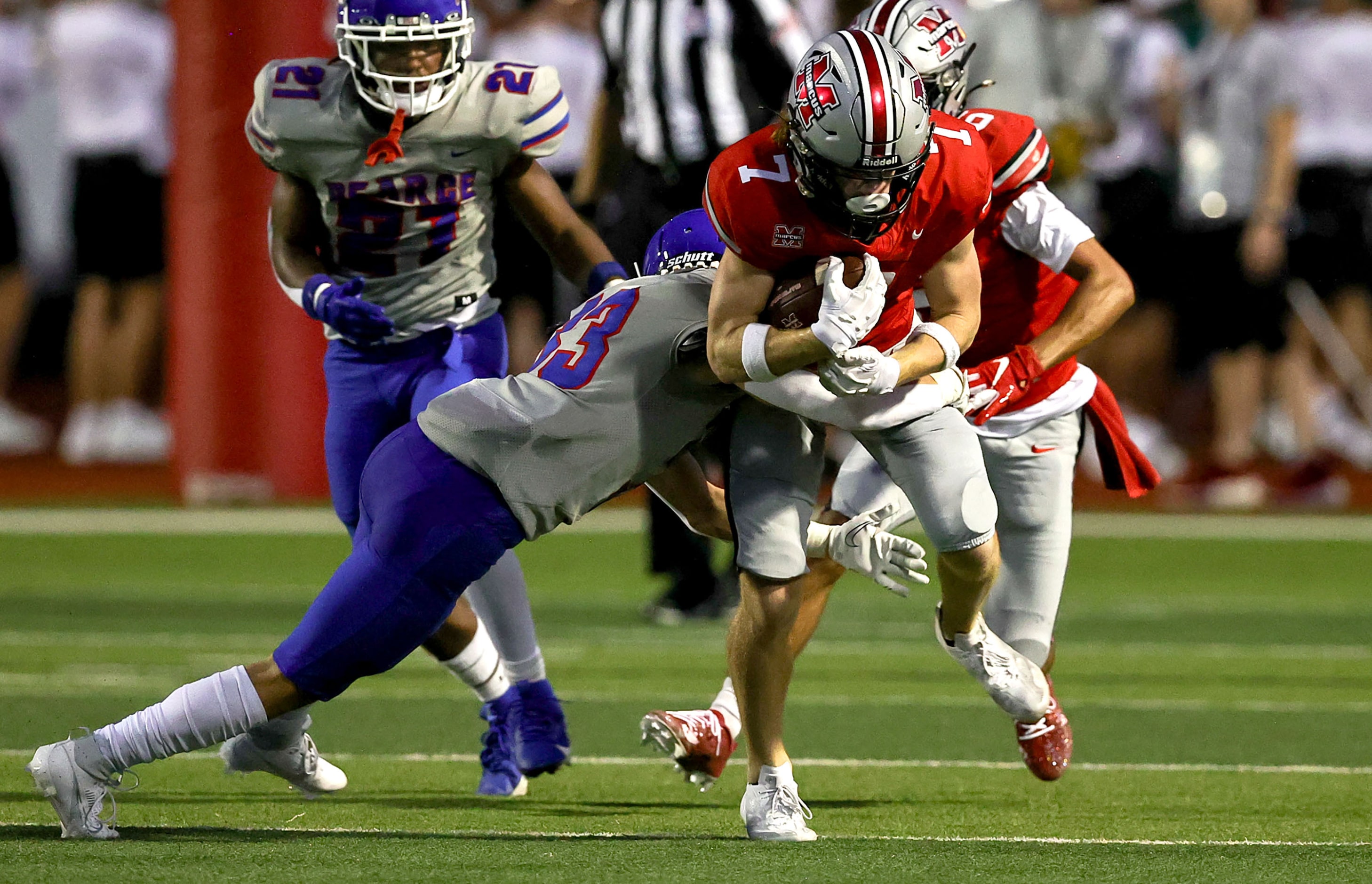 Flower Mound Marcus wide receiver Cooper Campbell (7) comes up with a reception and is...