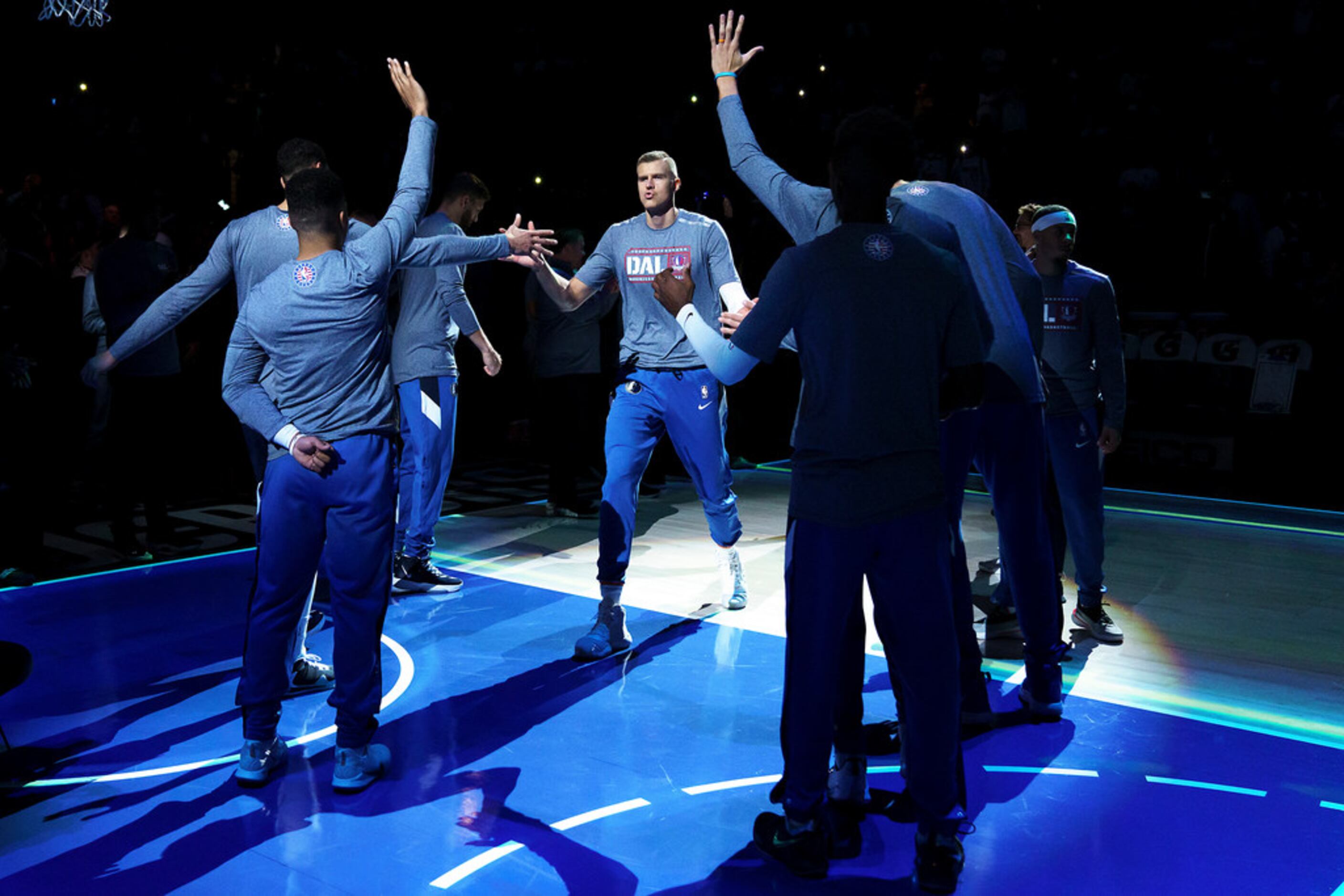 Dallas Mavericks forward Kristaps Porzingis takes the court before an NBA basketball game...