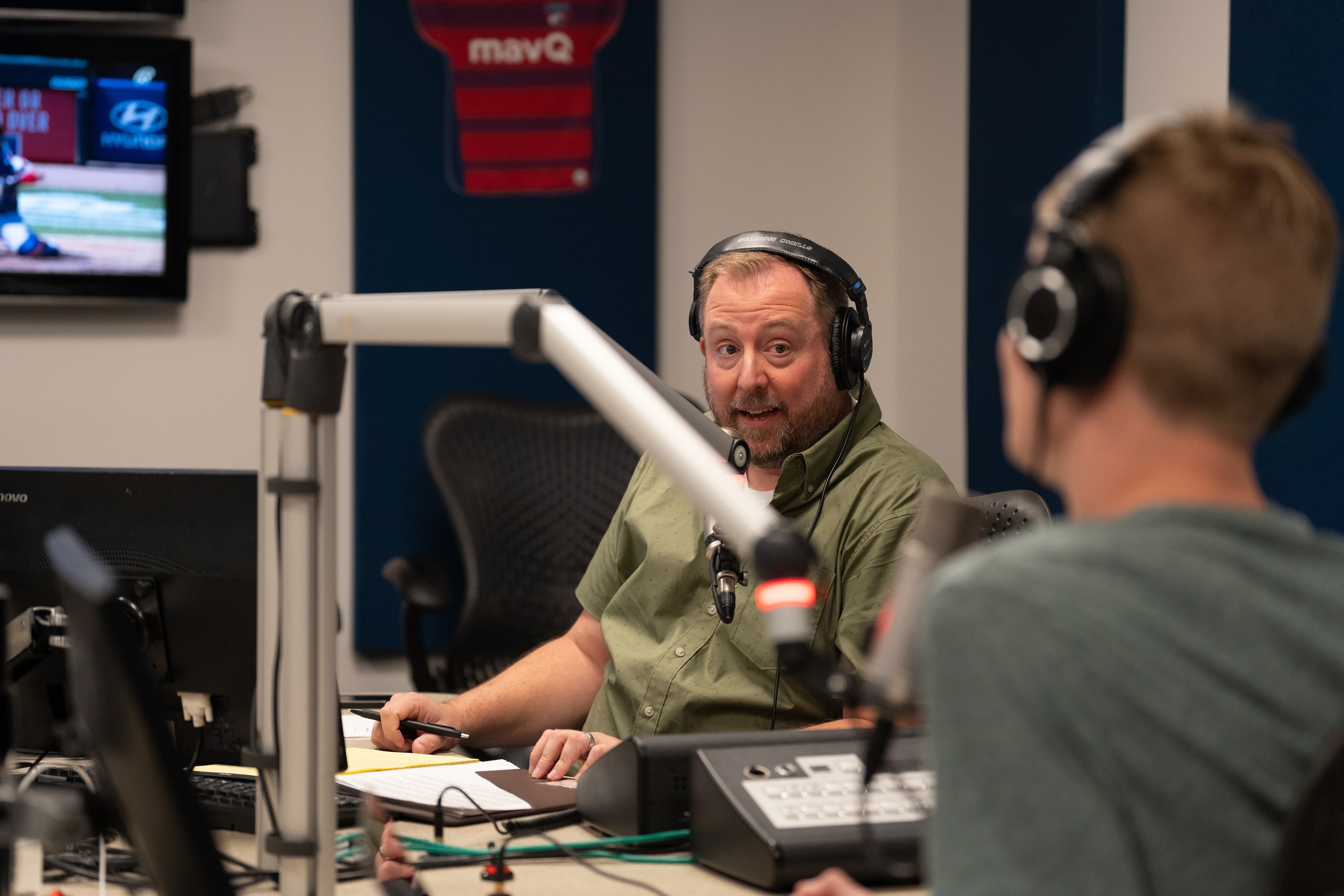 Sean Bass talks with David Mino on air during the Ticket, after having just hit their...