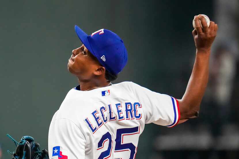 Texas Rangers relief pitcher Jose Leclerc (25) delivers during the ninth inning of the...