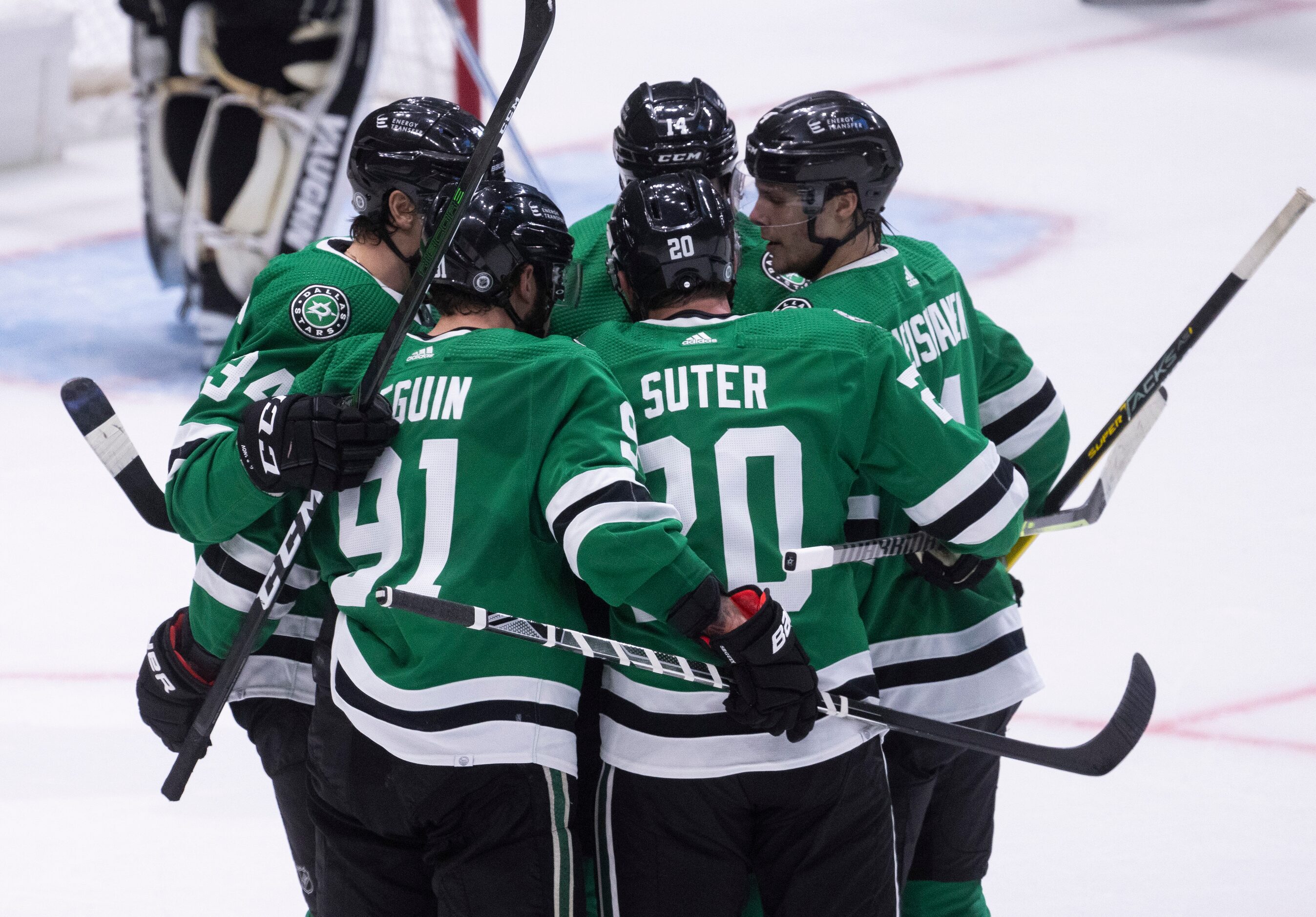 Players celebrate Dallas Stars center Tyler Seguin’s (91) score during the first period of a...