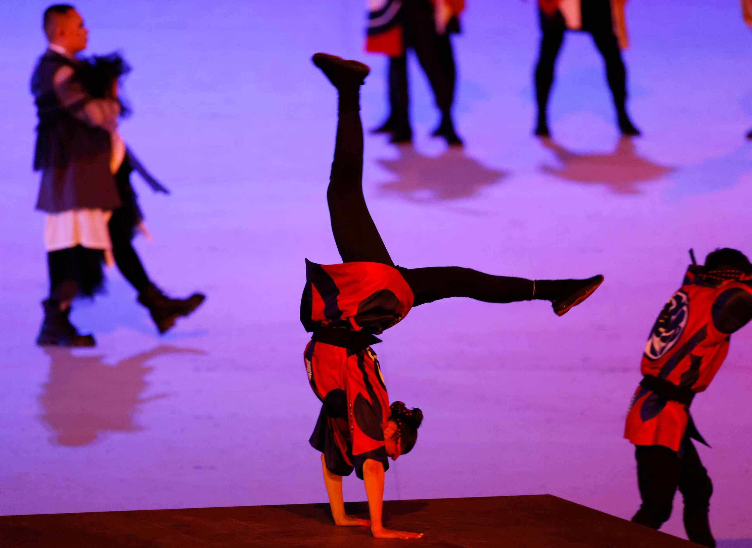 Dancers performs during the opening ceremony for the postponed 2020 Tokyo Olympics at...