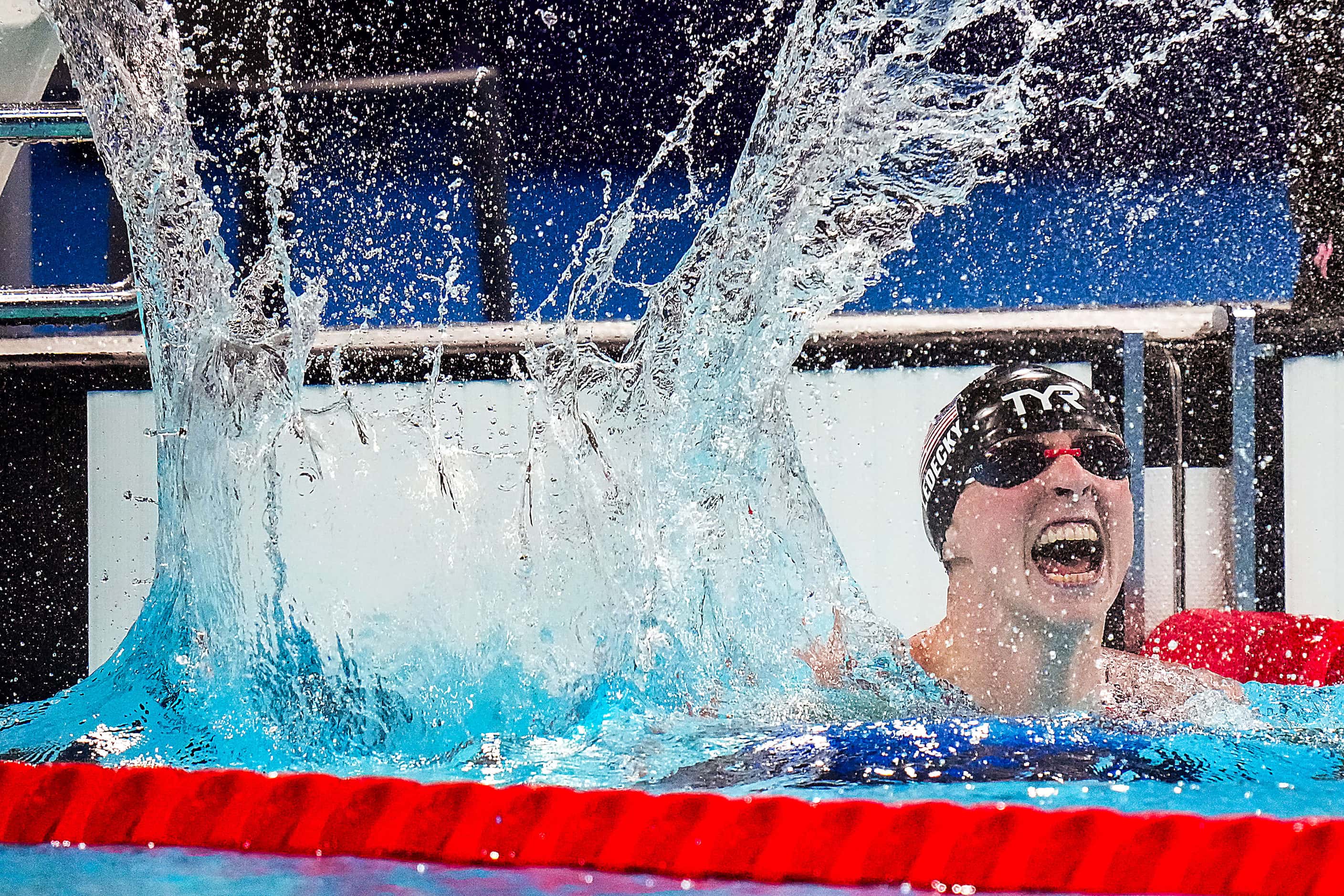 Katie Ledecky of the United States celebrates after winning the women's 1500-meter freestyle...