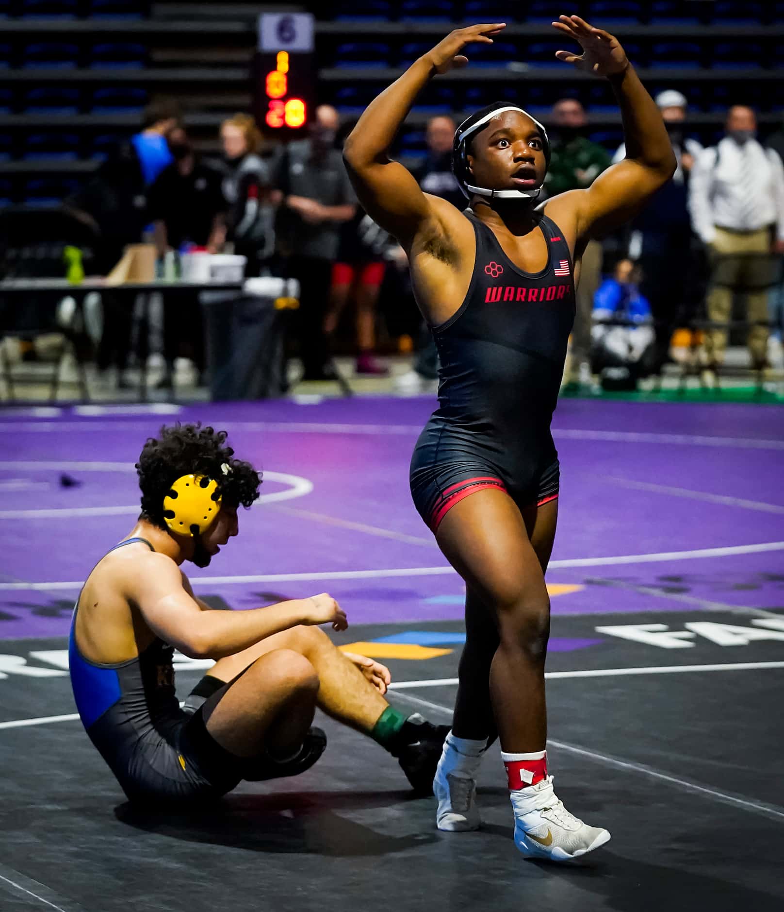 Donavan Whitted of Arlington Martin celebrates after defeating Roberto Bautista of Klein for...