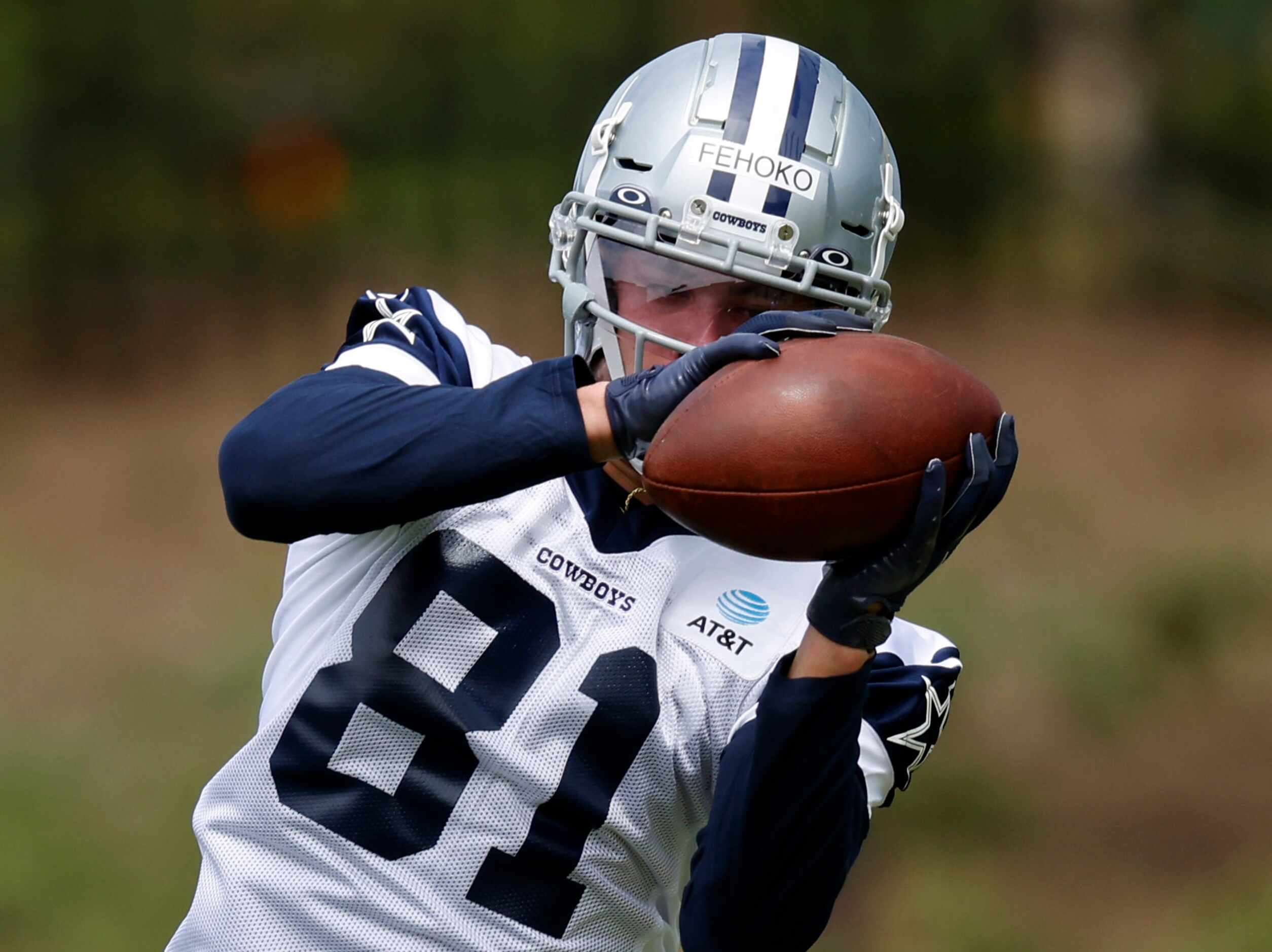 Dallas Cowboys rookie wide receiver Simi Fehoko (81) catches a ball during a rookie minicamp...