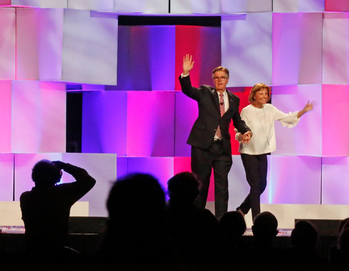 Texas Lieutenant Governor Dan Patrick and his wife wave to the crowd during the 2018 Texas...