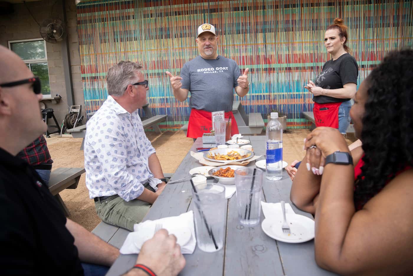 The Dallas Morning News’ Rangers reporter Evan Grant, center left, asks a table if they’re...