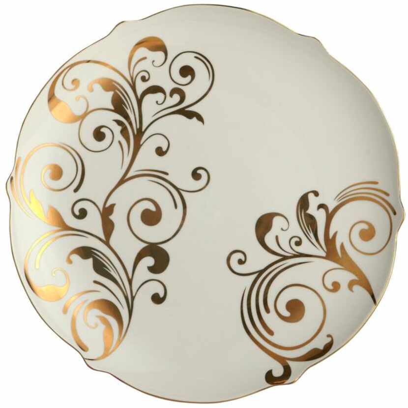 
White as snow: For formal holiday dinners, this glazed white stoneware, boldly accented...