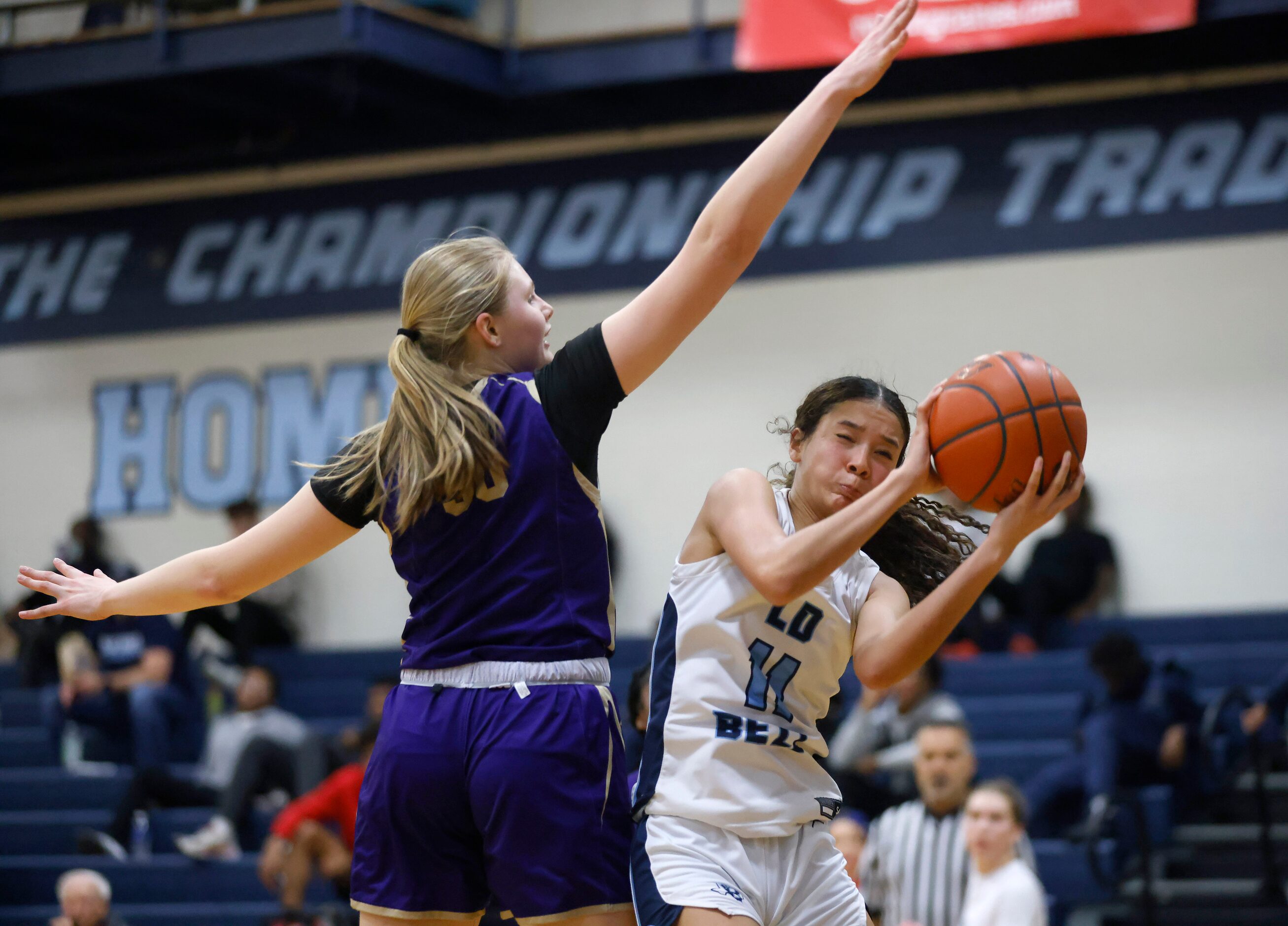 Hurst L.D. Bell guard Enyce Williams (11) comes down with a pass as she is covered by...