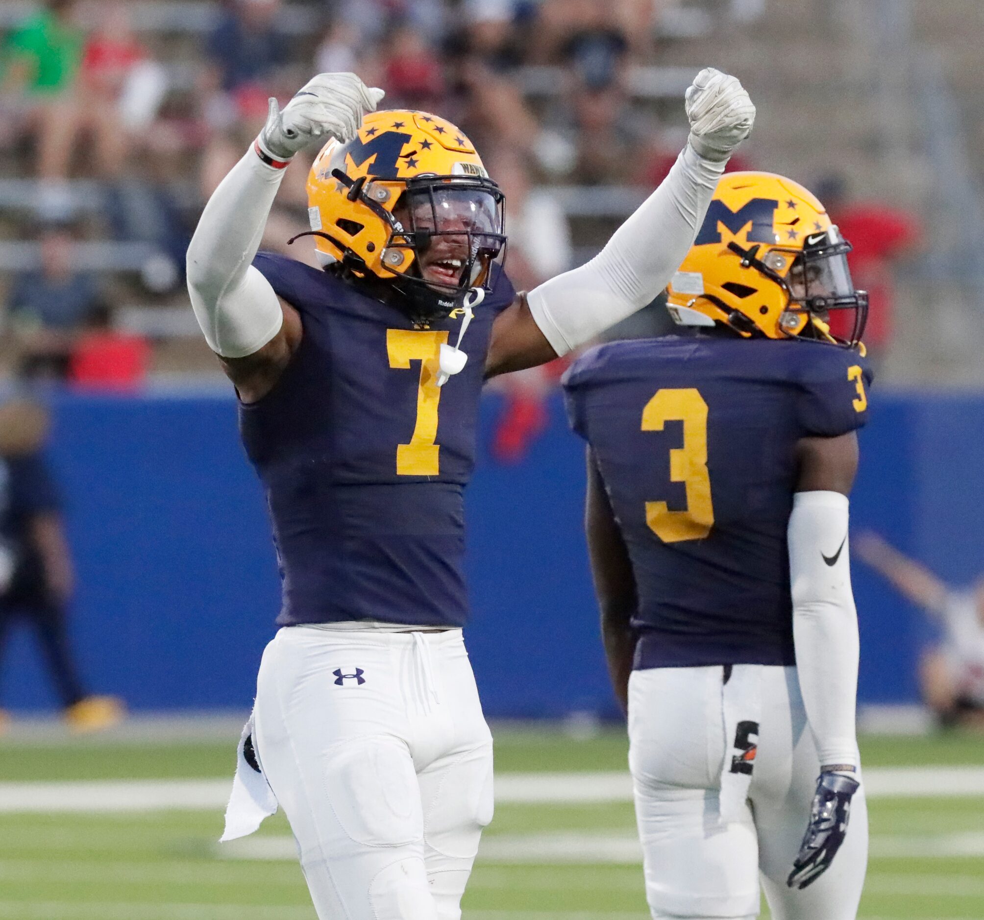 McKinney High School linebacker Riley Pettijohn (7) celebrates a tackle during the first...