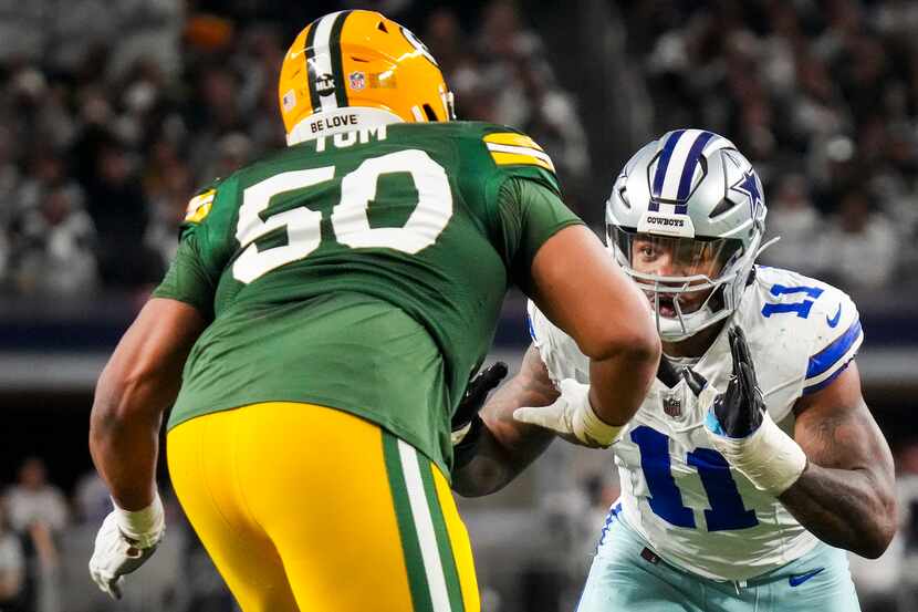 Dallas Cowboys linebacker Micah Parsons (11) works against Green Bay Packers guard Zach Tom...