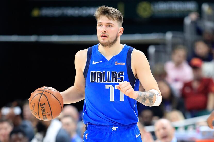 INDIANAPOLIS, IN - JANUARY 19:  Luka Doncic #77 of the Dallas Mavericks dribbles the ball...