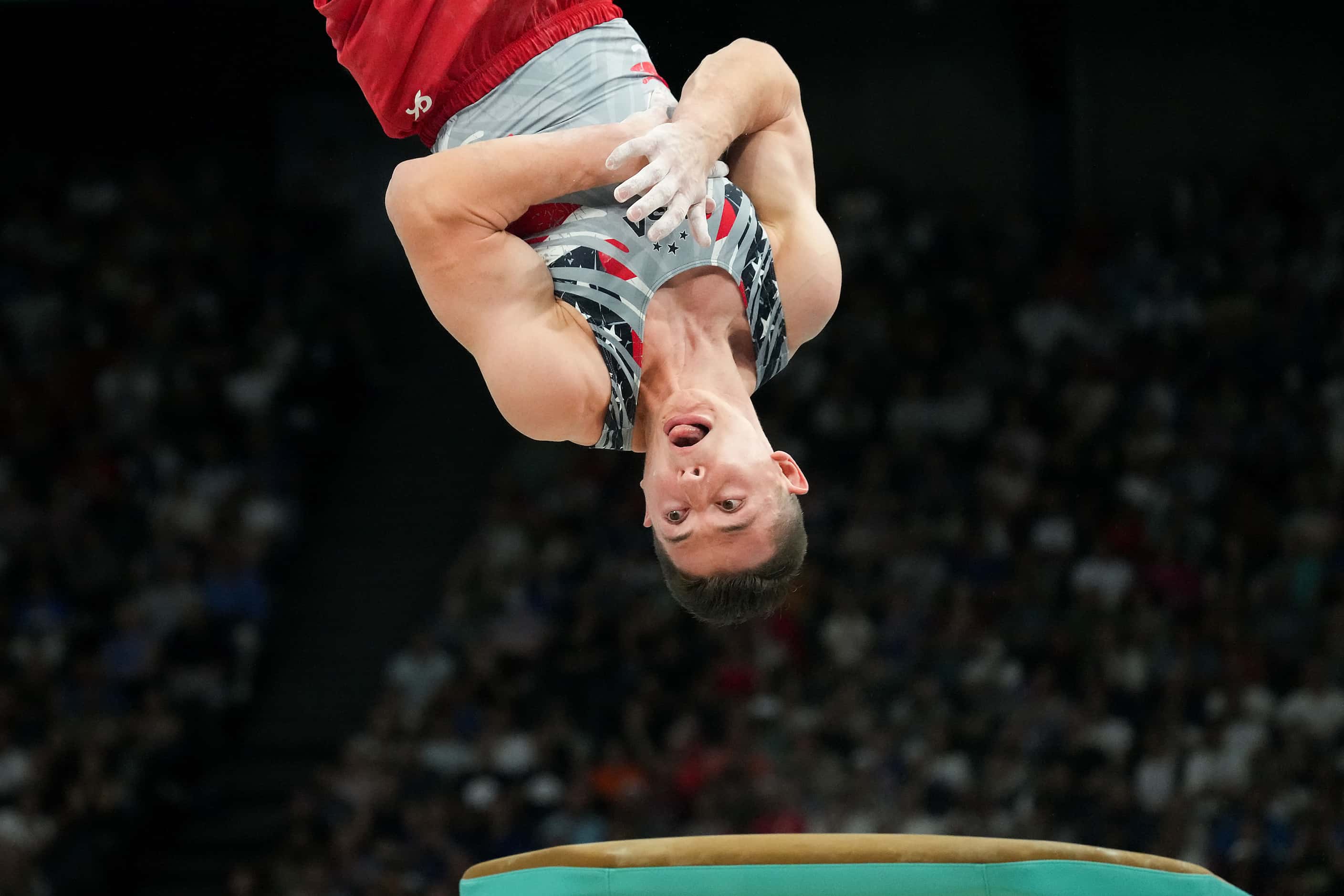 \Paul Juda  of the United States competes on the vault during the men’s gymnastics team...