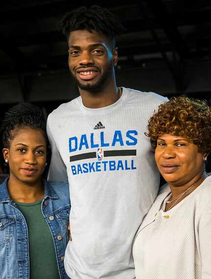 Dallas Mavericks forward Nerlens Noel poses for a photo with his sister Nashdah and mother...
