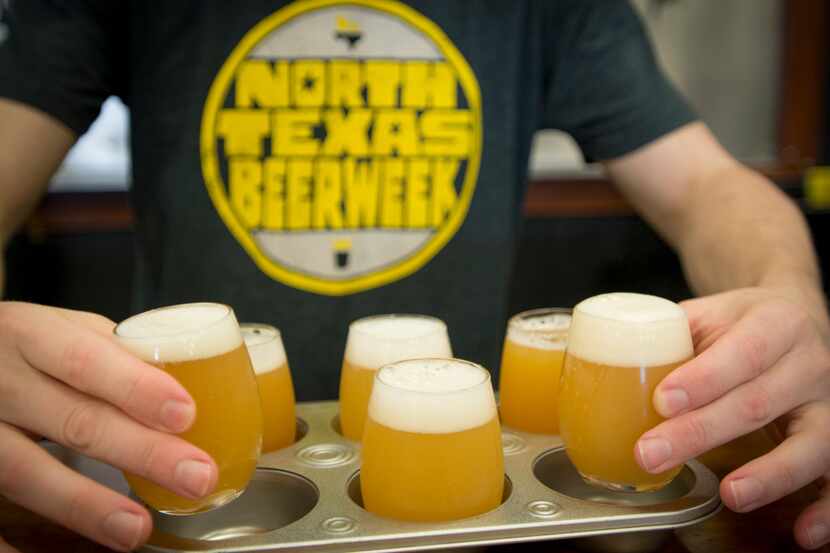 James Perry serves a flight of hazy beers at Turning Point in Bedford, Texas on September...