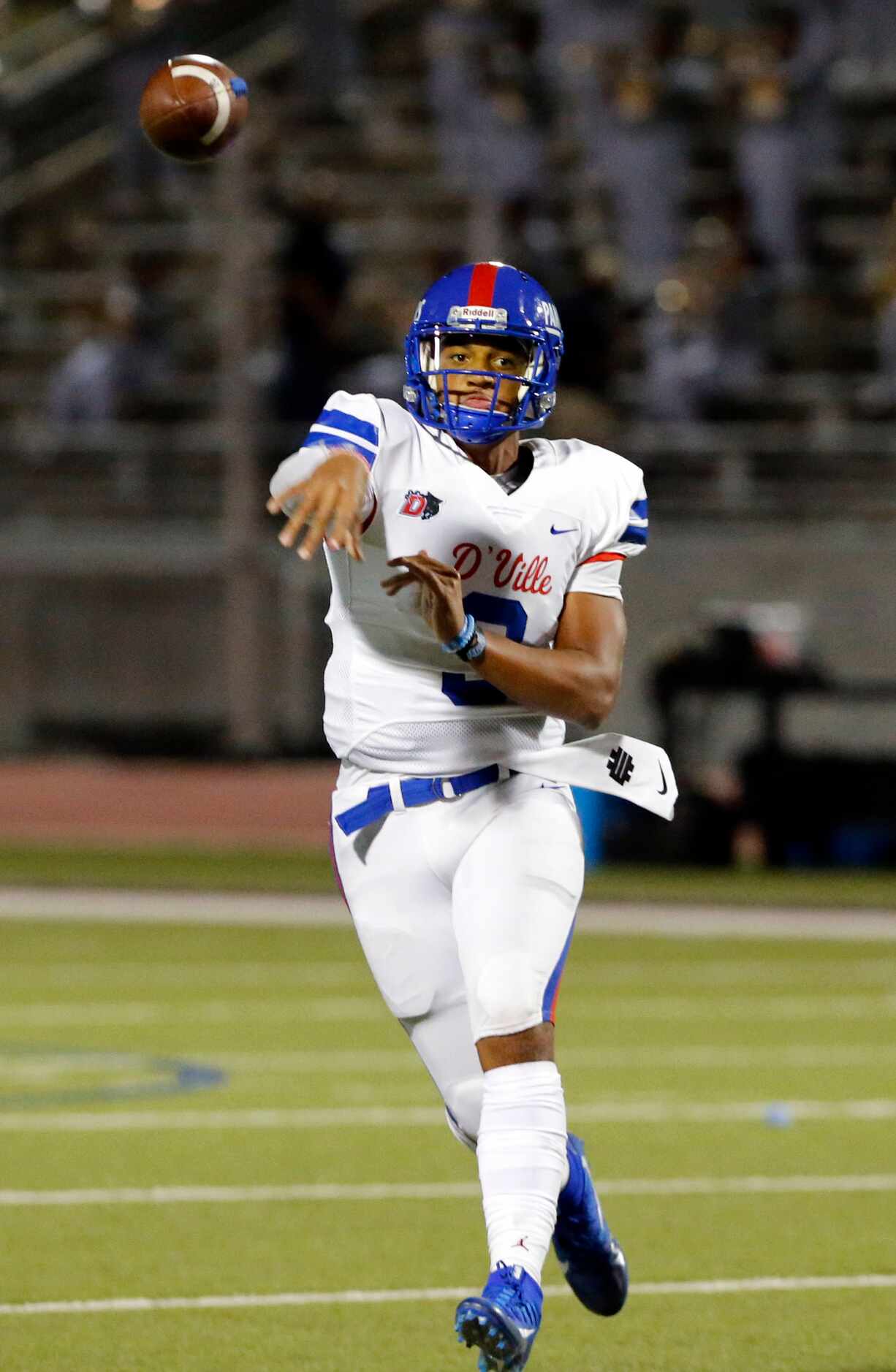 Duncanville QB Grayson James (3) throws a pass during the first half of high school football...