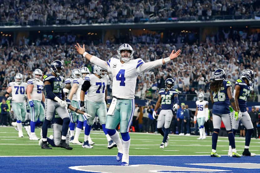 FILE — Dallas Cowboys quarterback Dak Prescott (4) celebrates after what what he thought was...