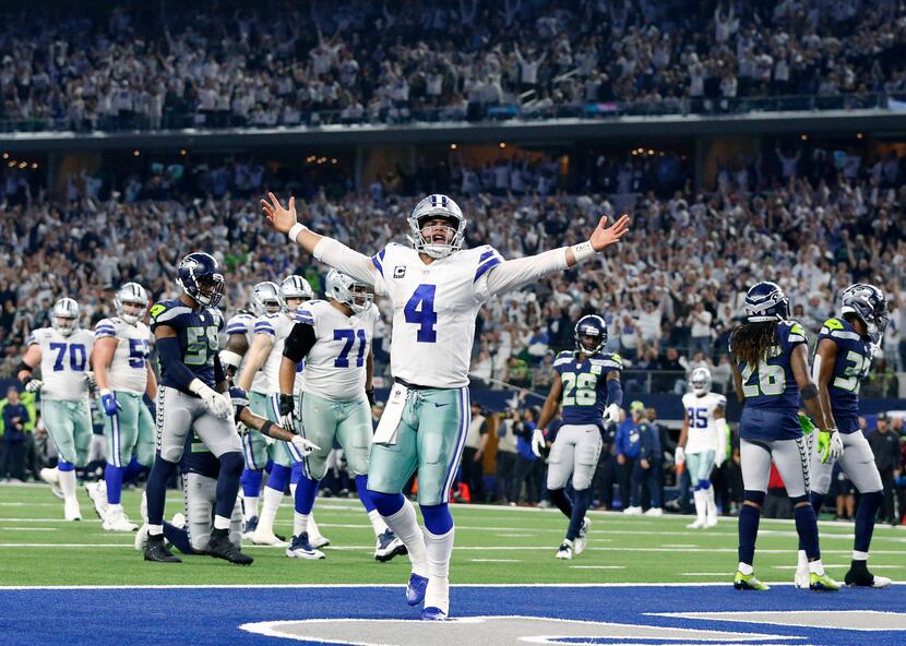 Dallas Cowboys quarterback Dak Prescott (4) celebrates after what what he thought was a...