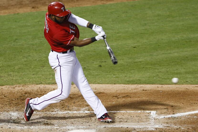 Sep 23, 2013; Arlington, TX, USA; Texas Rangers shortstop Elvis Andrus (1) hits an RBI...