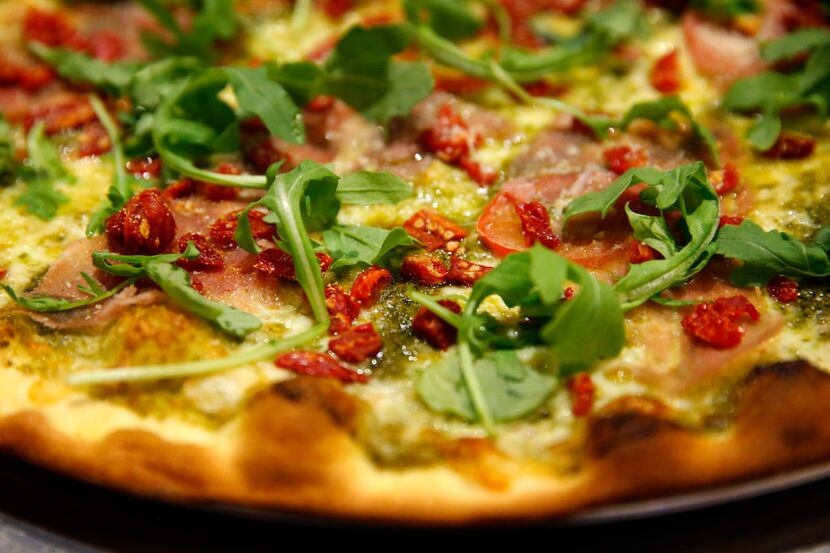 Pesto Sciutto Pizza is made fresh by pizza slayers at Greenville Avenue Pizza Company...
