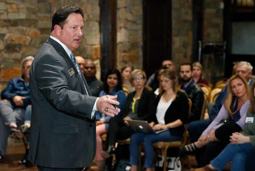 Rick McDaniel, McKinney ISD superintendent, addresses the audience at a town hall on school...