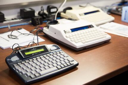 A teletypewriter or TTY device, invented in the 1960s, is a way that deaf people call 911....