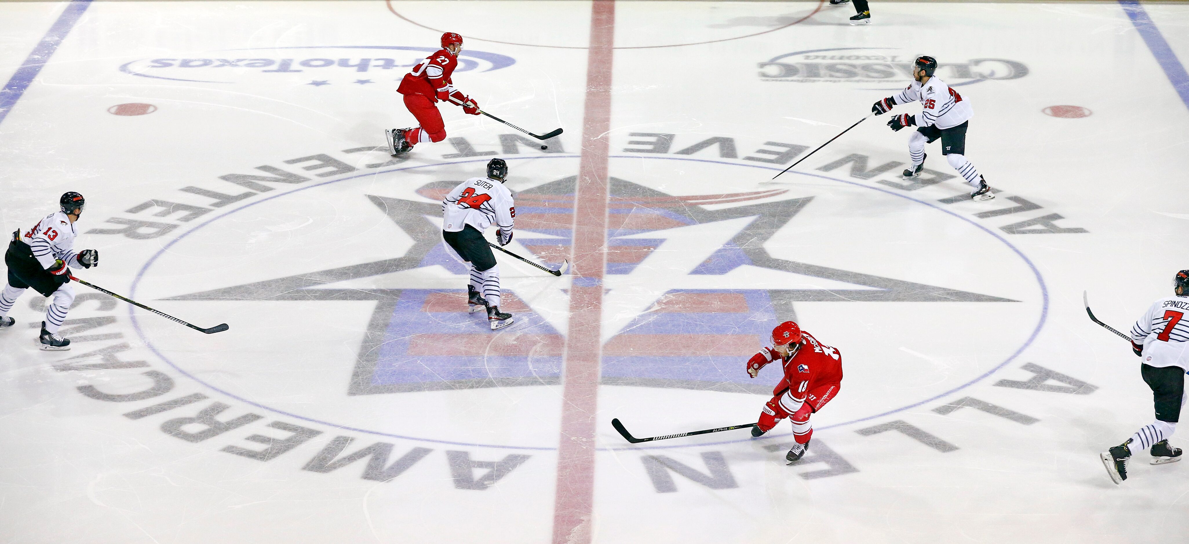 The Allen Americans and Rapid City Rush hockey players compete during the season opener at...