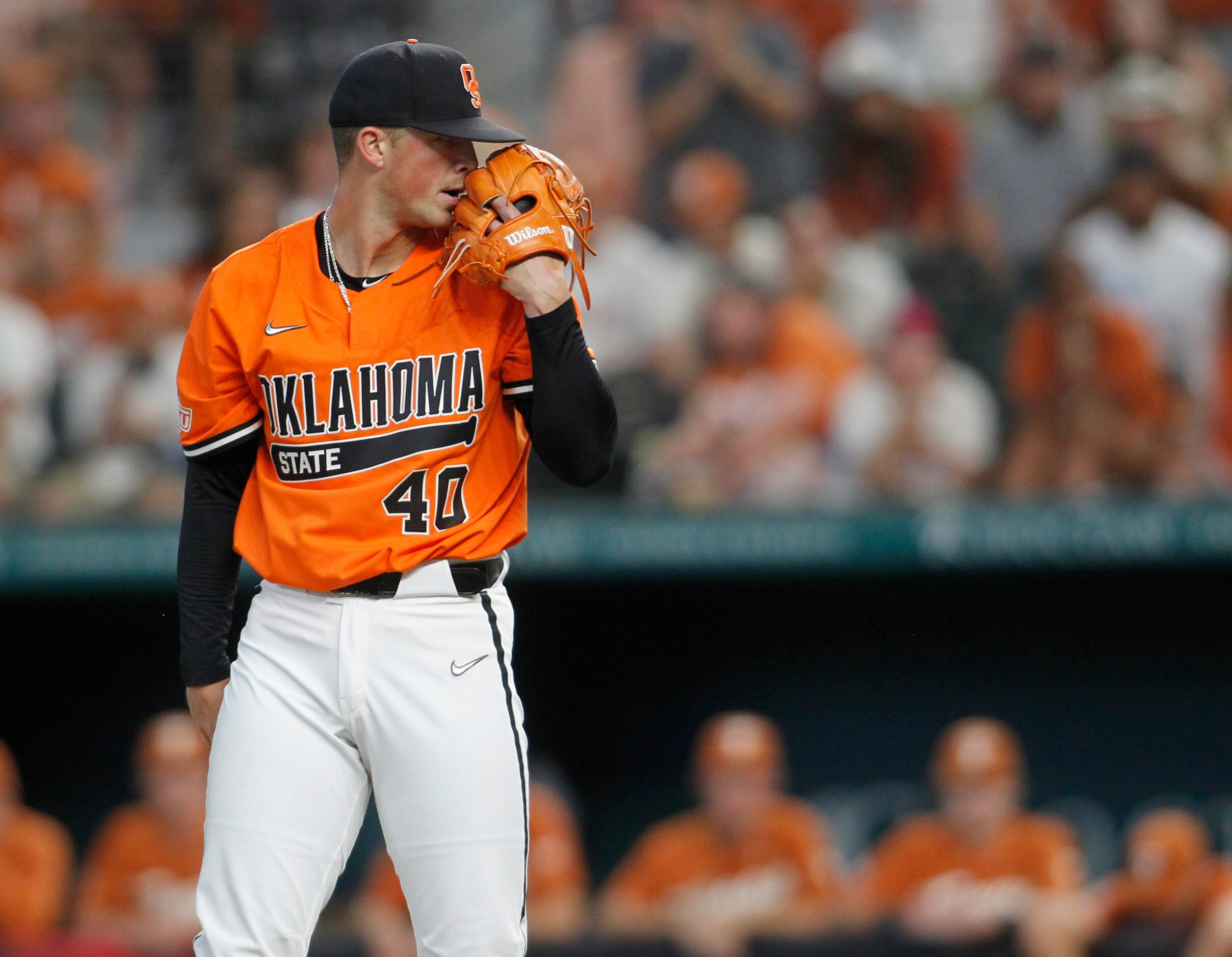 Oklahoma State pitcher Kale Davis (40) reads the signs from his catcher during the 3rd...