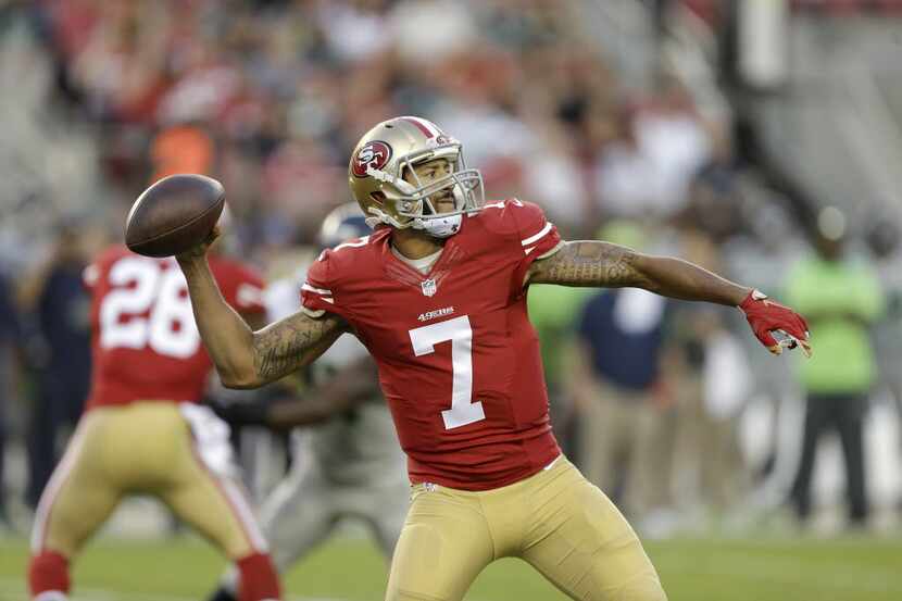 FILE: In this photo from Thursday, Oct. 22, 2015, San Francisco 49ers quarterback Colin...